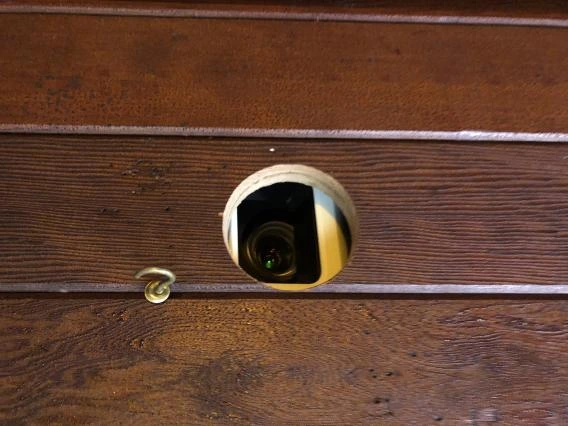 hidden projector behind a wall