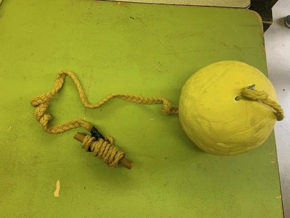 Sun with cord partially unraveled